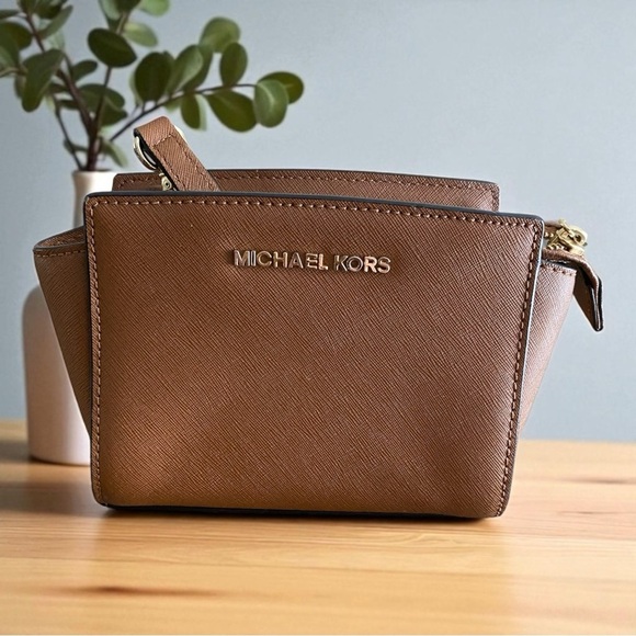 Michael Kors Handbags - Michael Kors Tan Crossbody Bag with Adjustable Strap and Minimalist Design